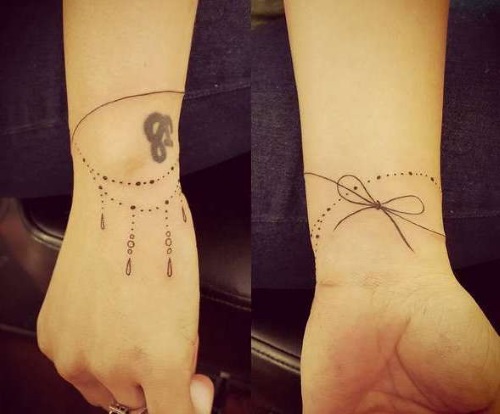 Tatuaż na nadgarstku dla dziewczynek. Zdjęcia, szkice, napisy z tłumaczeniem, na sukces i szczęście, kwiaty, drzewo życia. Znaczenie tatuaży